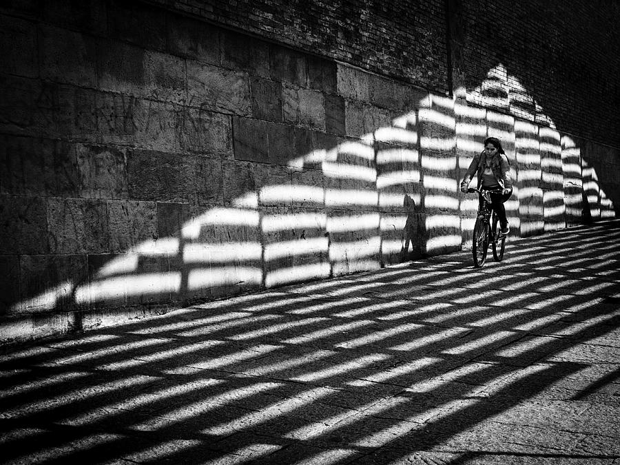 Cyclist Between Lights Photograph by Adolfo Urrutia