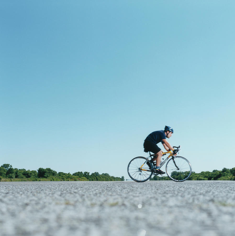 Cyclist On Road Photograph by Johannes Kroemer