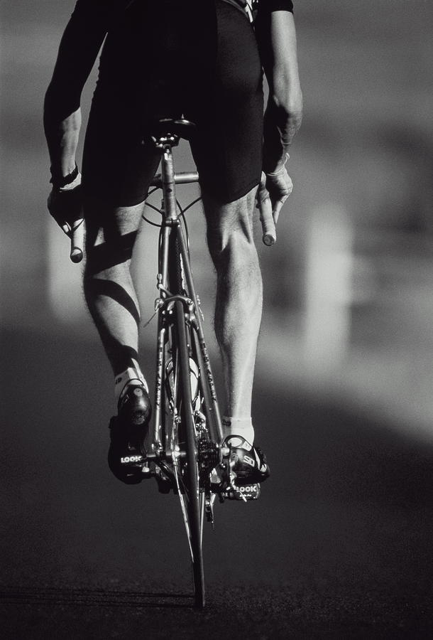 Cyclist On Road, Rear View B&w by Brian Bailey