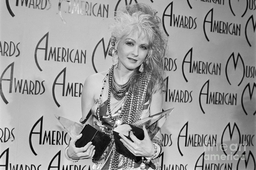 Music Photograph - Cyndi Lauper Holding Music Awards by Bettmann