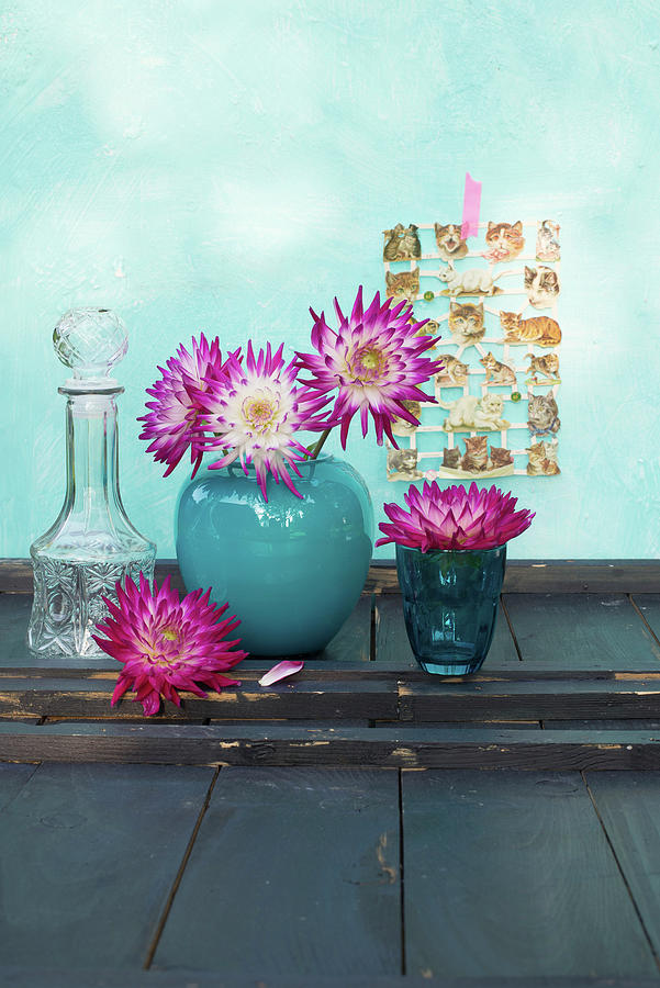Dahlias In Blue Vase And Blue Glass Photograph by Patsy&christian
