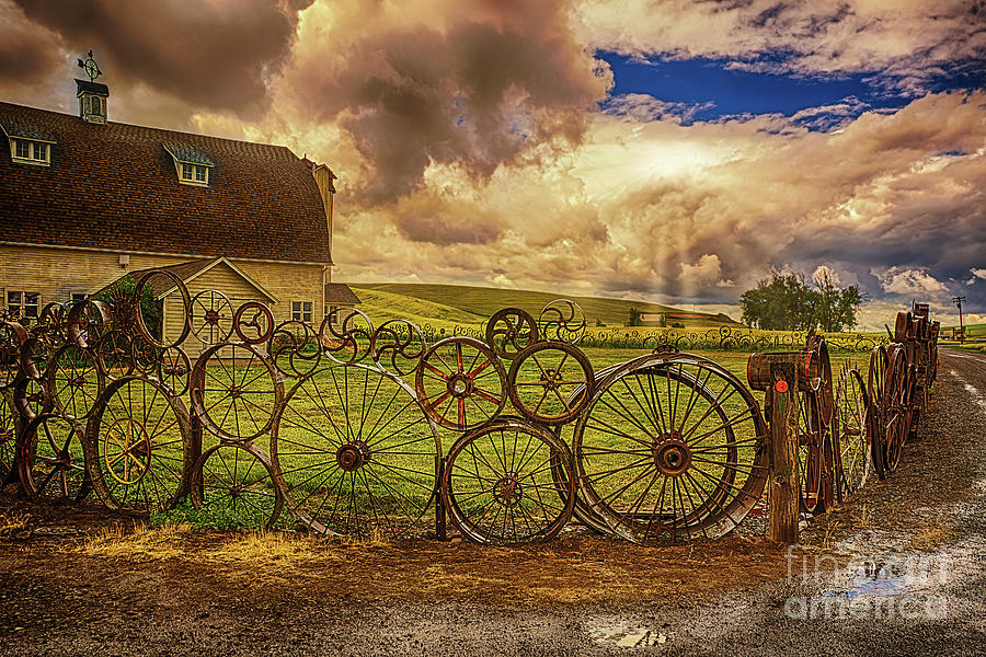 Dahmen Barn and Wheel Fence Photograph by Priscilla Burgers