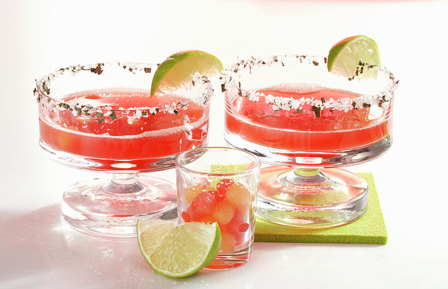 Daiquiris With Watermelon, Rum, Orange Liqueur And Lime Juice In Glasses With Sugared Rims Photograph by Teubner Foodfoto