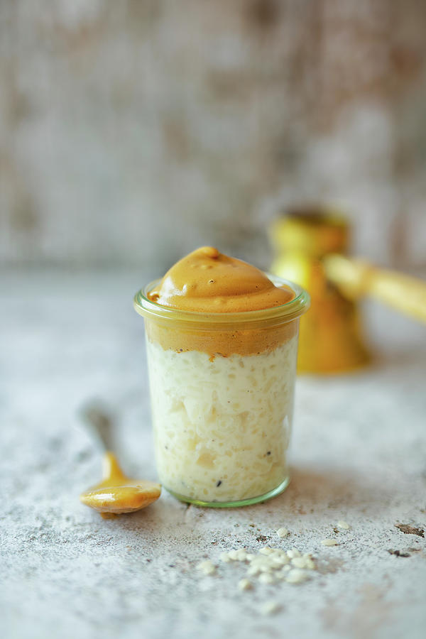Dalgona Rice Pudding With Vanilla And Espresso Cream Photograph by Jan Wischnewski