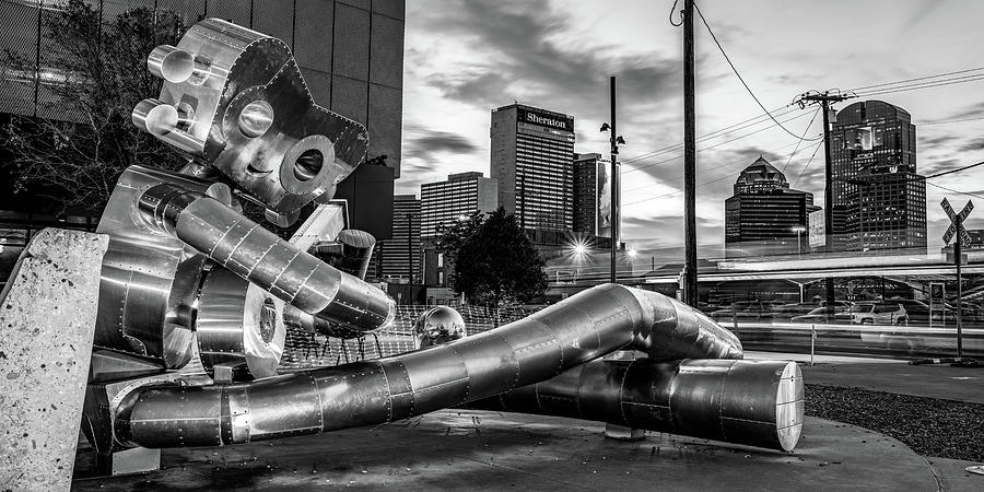Dallas Skyline and Traveling Man Panorama - Black and White Photograph by Gregory Ballos