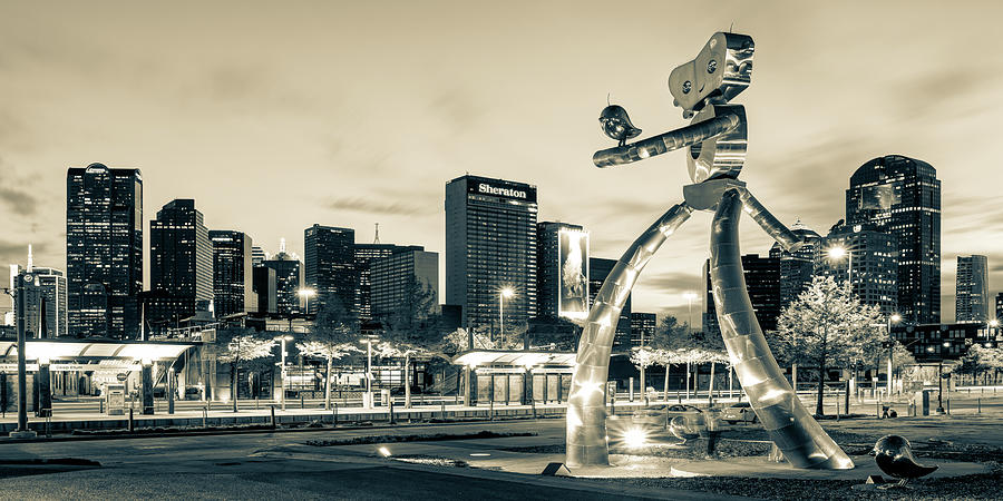 Dallas Skyline and Walking Tall Traveling Man Panorama - Sepia Edition Photograph by Gregory Ballos