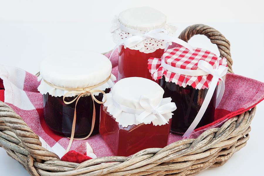 Damson Jam And Medlar Jelly In A Basket As A Christmas Gift Photograph by Linda Burgess