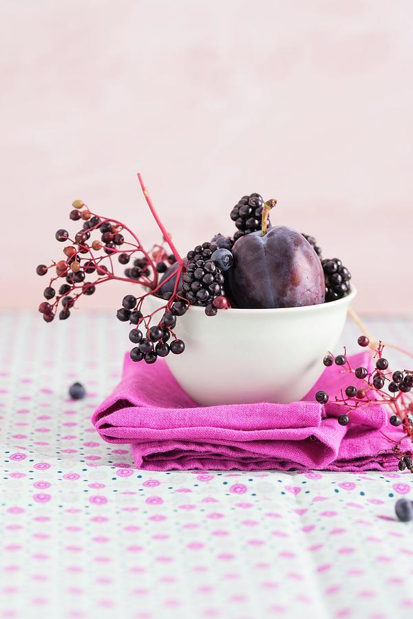 Damsons, Elderberries, Blackberries And Blueberries In A Bowl Photograph by Mandy Reschke
