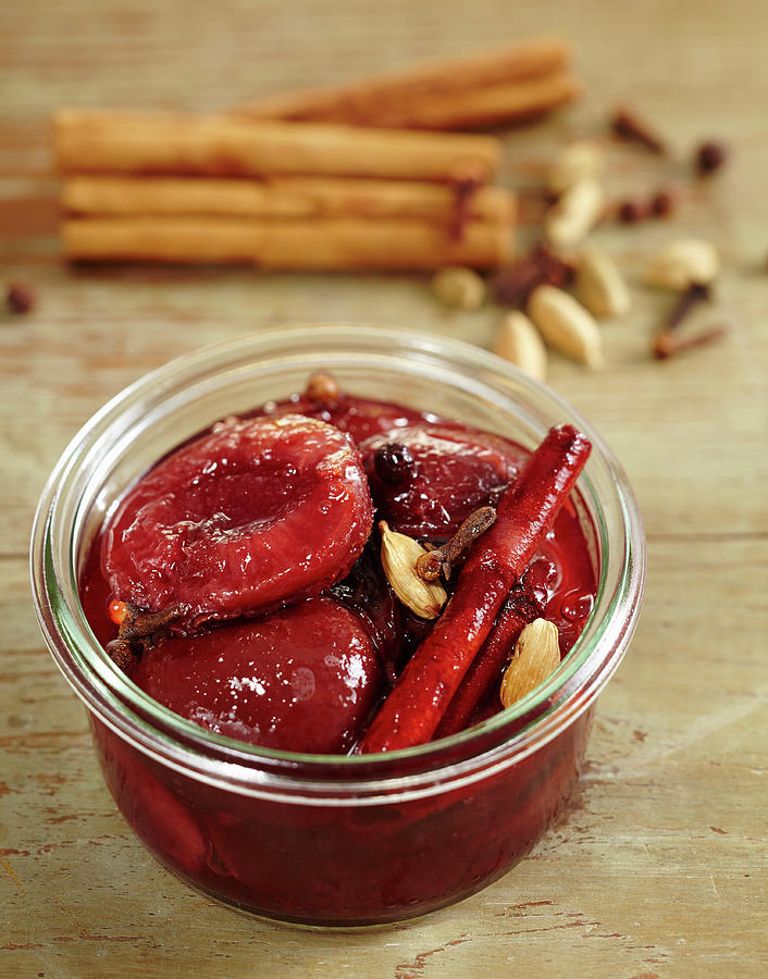 Damsons With Cinnamon, Cardamom And Cloves Photograph by Teubner Foodfoto