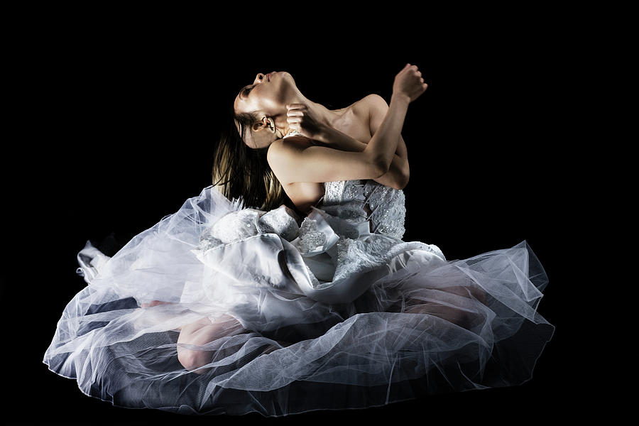 Dancer In Elegant Pose Wearing Gown Photograph by Patrik Giardino