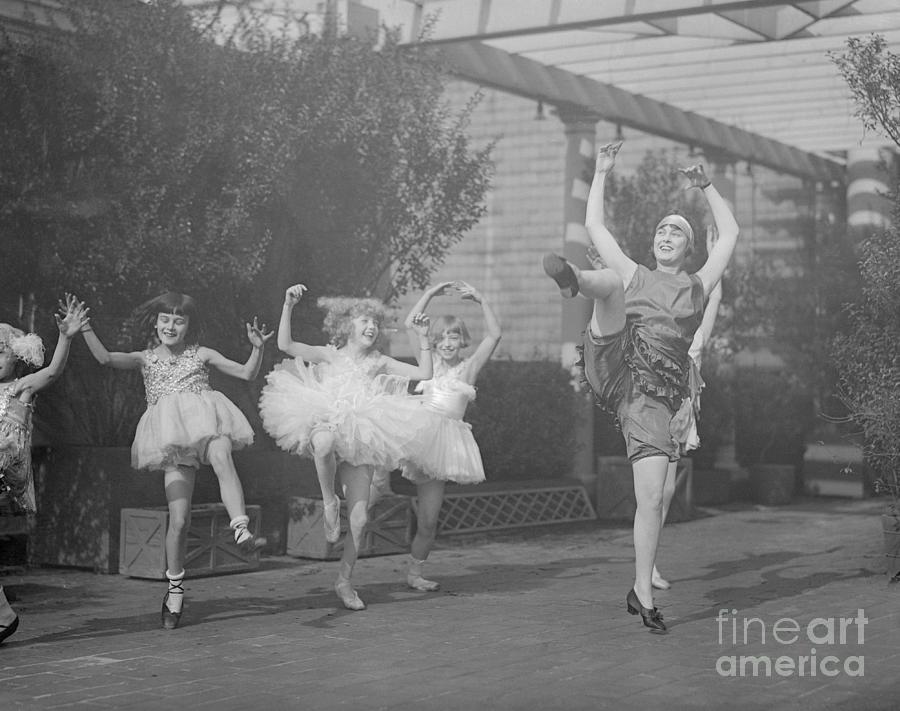 Dancers Kicking Legs Photograph by Bettmann