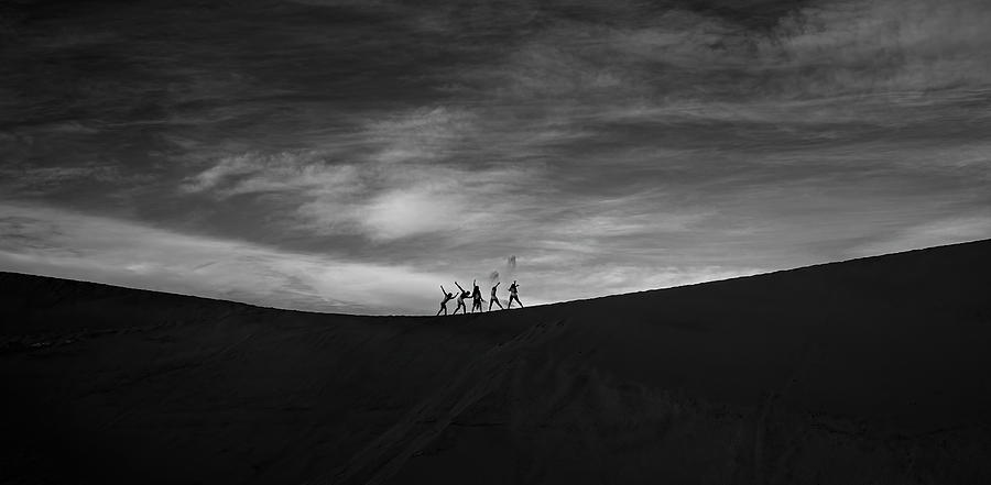Dancers On Desert Photograph by Johnson Huang