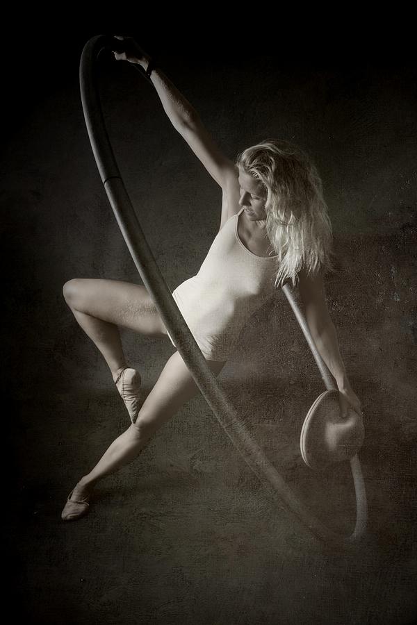 Dancing With A Wheel Photograph by Olga Mest