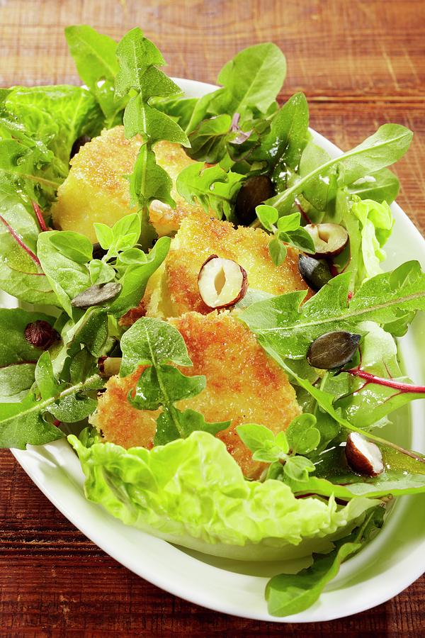 Dandelion Salad With Baked Camembert Photograph by Bjrn Llf