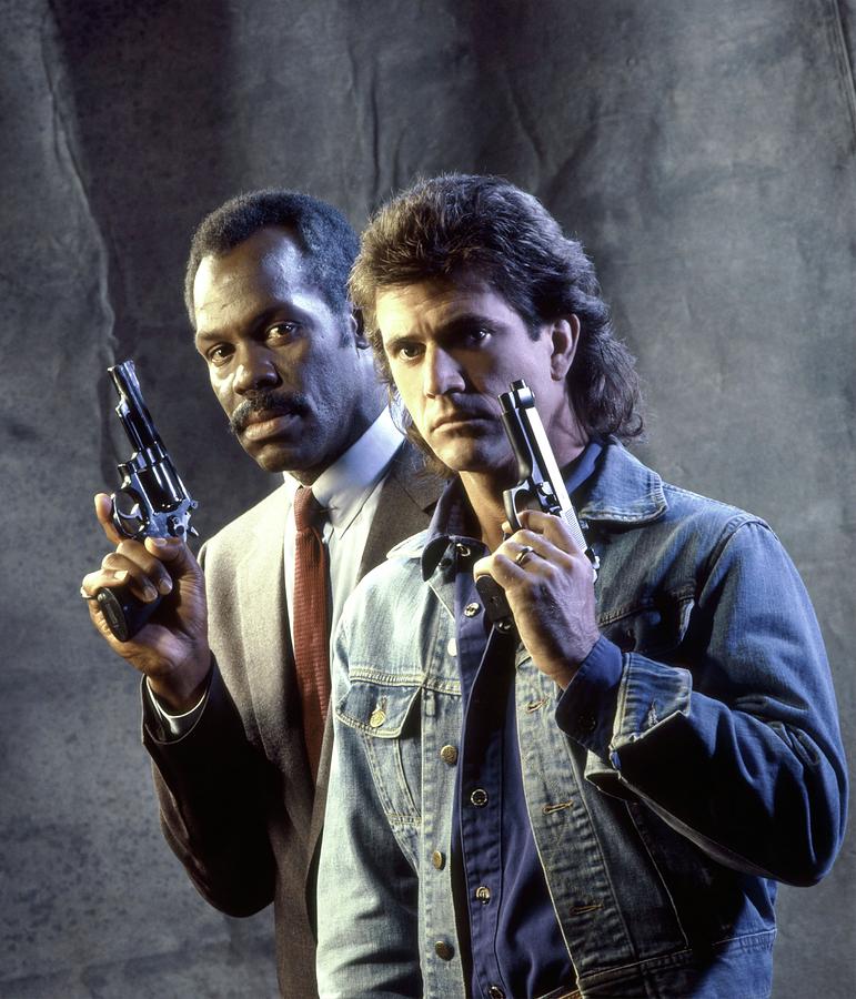 DANNY GLOVER and MEL GIBSON in LETHAL WEAPON -1987-. Photograph by Album