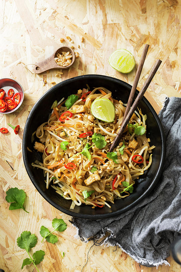 Dark Bowl Of Thai Street Food, Tofu, Noodles And Vegetable Photograph by Stacy Grant
