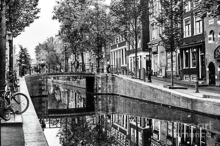 Dark Canal in Amsterdam Photograph by John Rizzuto