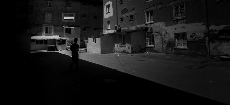 Black And White Photograph - Dark Side Of The Street by Behlul Ucar
