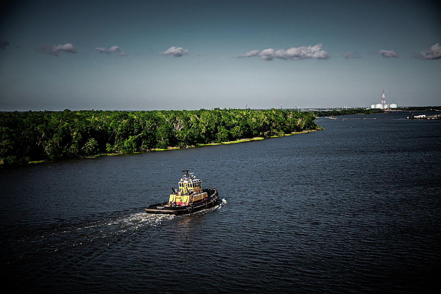 Dark Tugboat on River Photograph by Darryl Brooks