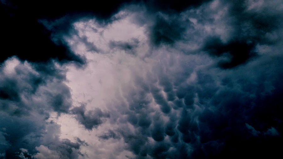 Darkened Mammatus Clouds Photograph