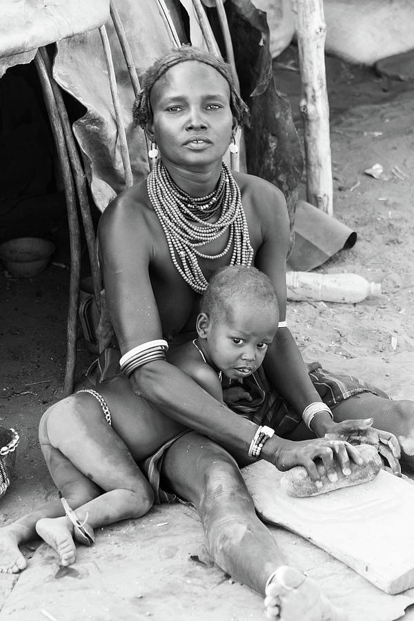 Dassanech mother and child Photograph by Mache Del Campo