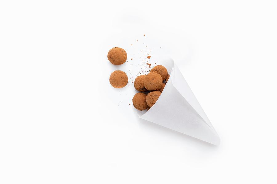 Date And Almond Mousse Sweets In A Carob Coating Photograph by Jalag / Stefan Bleschke