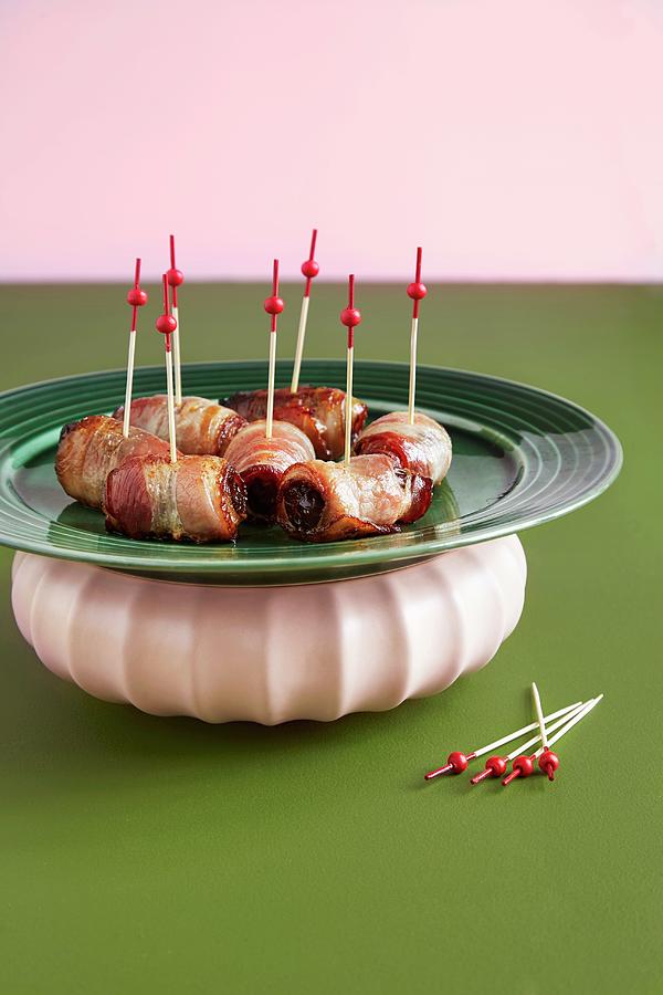Dates Wrapped In Bacon With Party Skewers Photograph by Aina C. Hole