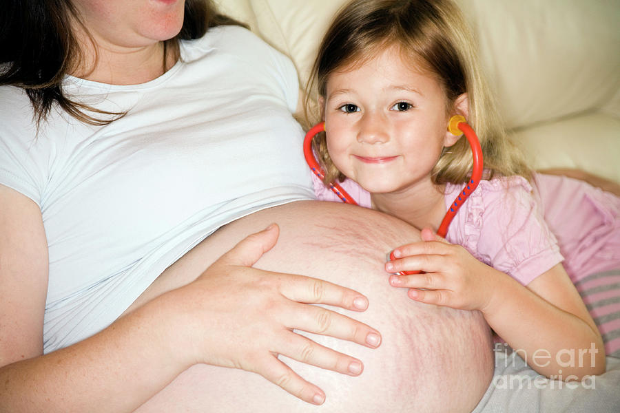 Daughter Using A Toy Stethoscope Photograph by Science Photo Library Daughter Using A Toy Stethoscope Photograph by Science Photo Library