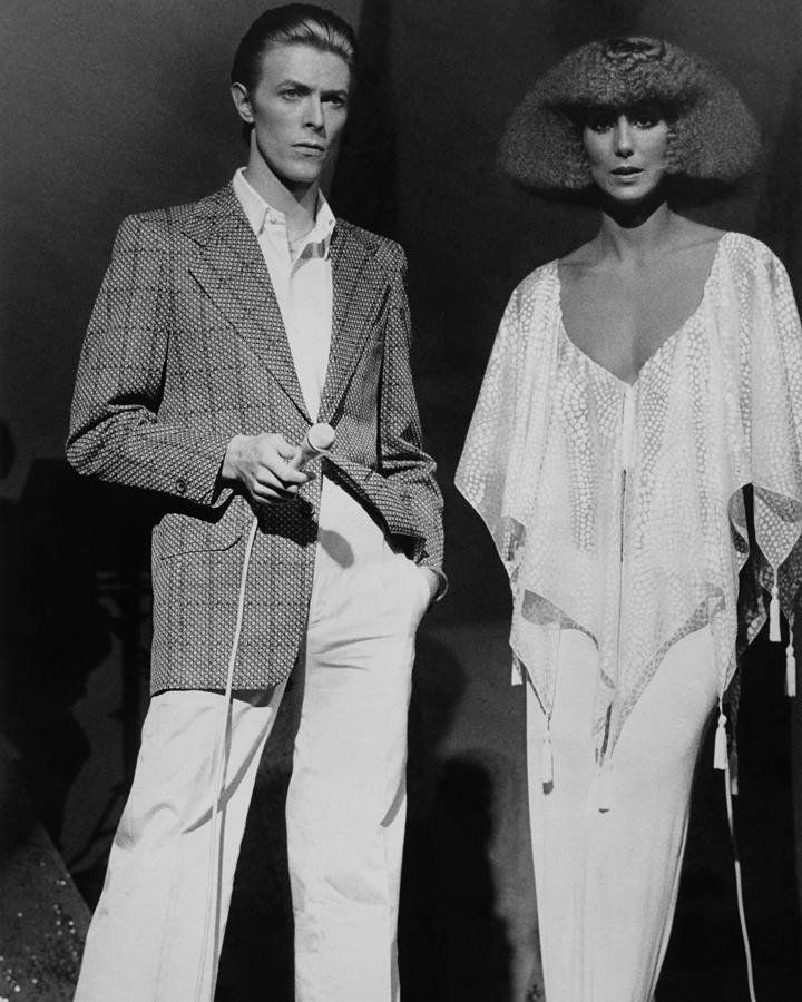 Cher Photograph - David Bowie And Cher: Fashion Icons Of The Age by Globe Photoa