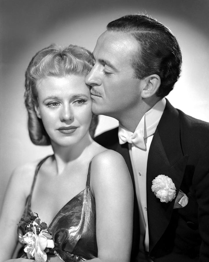 David Niven Kissing Ginger Rogers Photograph by Globe Photos - Pixels