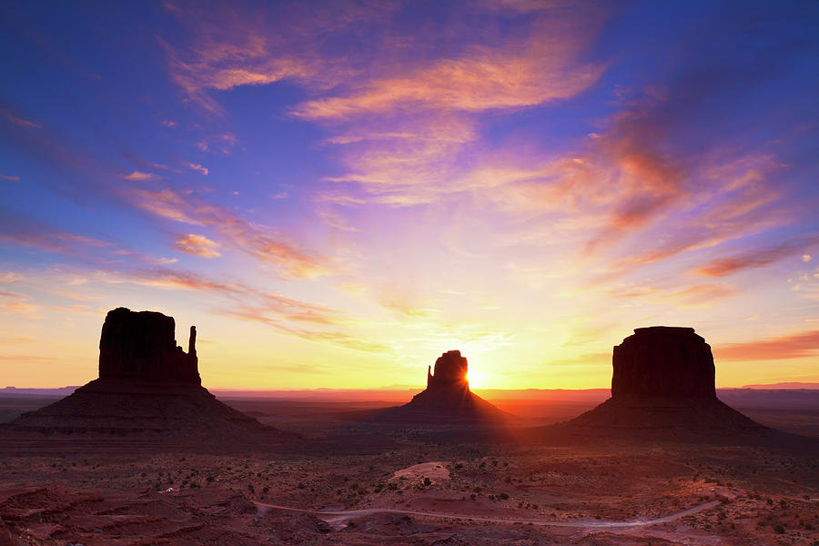 Dawn At Monument Valley Photograph by Glowingearth