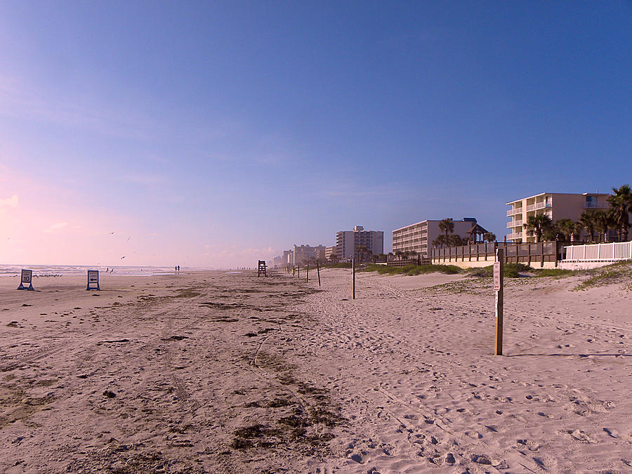  Daybreak Stroll on Daytona Beach Photograph by Christopher Mercer