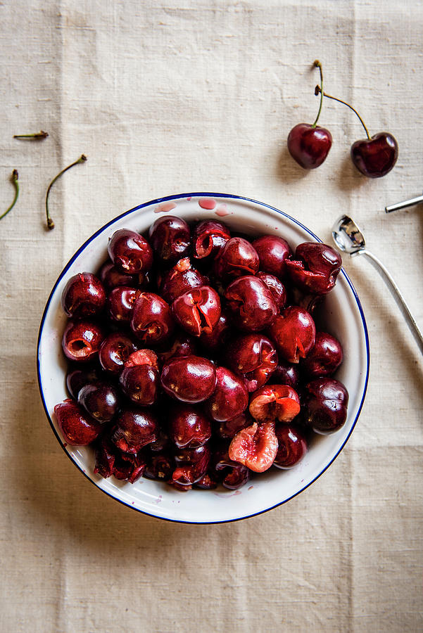 De-stoned Cherries In A Bowl Photograph by Magdalena Hendey