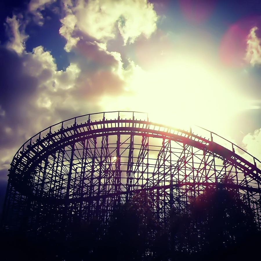 Decaying wooden rollercoaster in abandoned theme park Photograph by ...