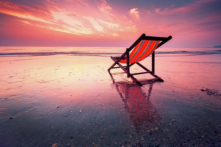 Deck Chair On The Beach Before Sunrise Photograph by Fredfroese