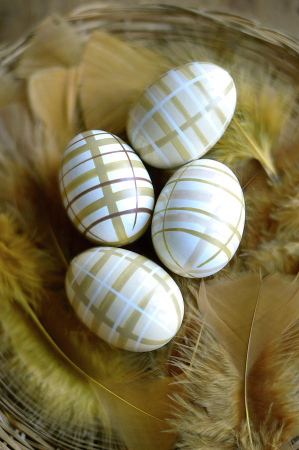 Decorated Easter Eggs And Golden Feathers Photograph by Keroudan