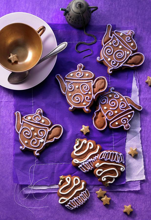 Decorated Gingerbread Biscuits Shaped Like Teapots And Cupcakes Photograph by Jalag / Jan-peter Westermann