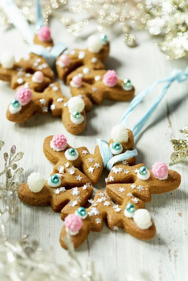 Decorated Gingerbread Stars For Hanging On A Christmas Tree Photograph by Jonathan Short