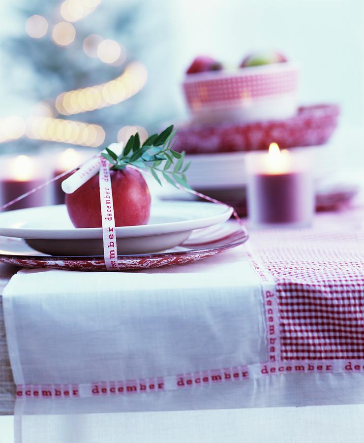 Decorative Advent Place Setting On Red And White Checked Tablecloth Photograph by Matteo Manduzio
