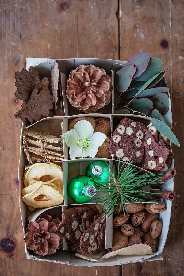 Decorative Natural Materials, Hazelnut Biscuits And Christmas Decorations In Box Photograph by Syl Loves