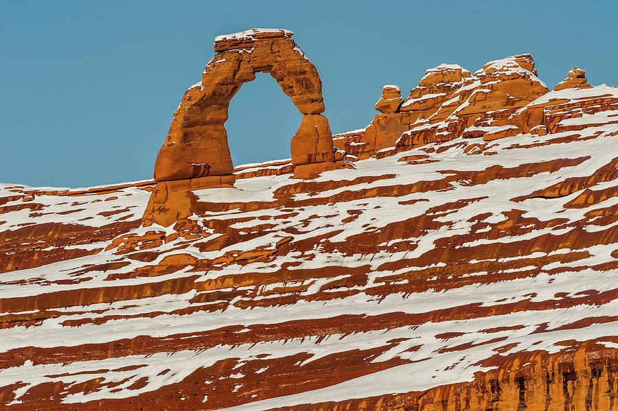 Delicate Arch In Winter Photograph by Jeff Foott