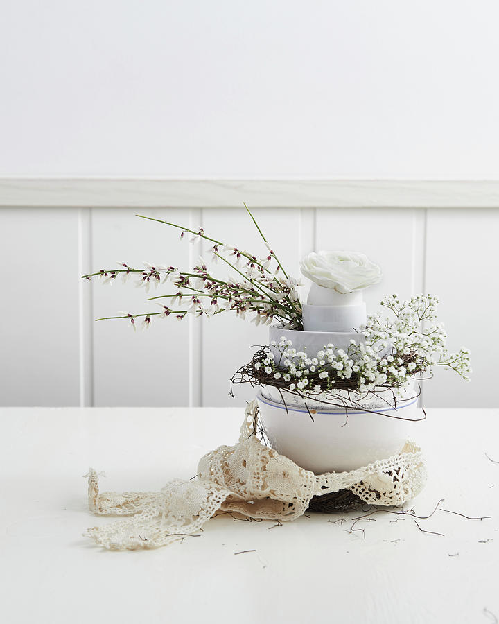 Delicate Easter Arrangement With Ranunculus And Gypsophila Photograph by Hannah Kompanik