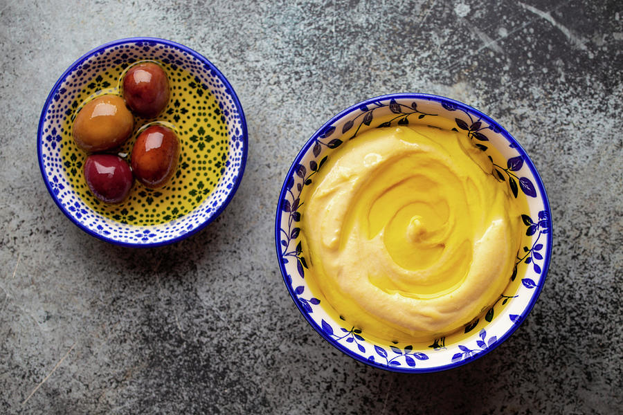 Delicious Hummus Served With Olives In Olive Oil Photograph by Olena Yeromenko