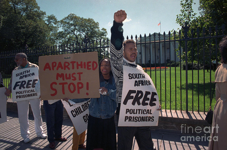 Demonstrators Protesting Outside White Photograph by Bettmann