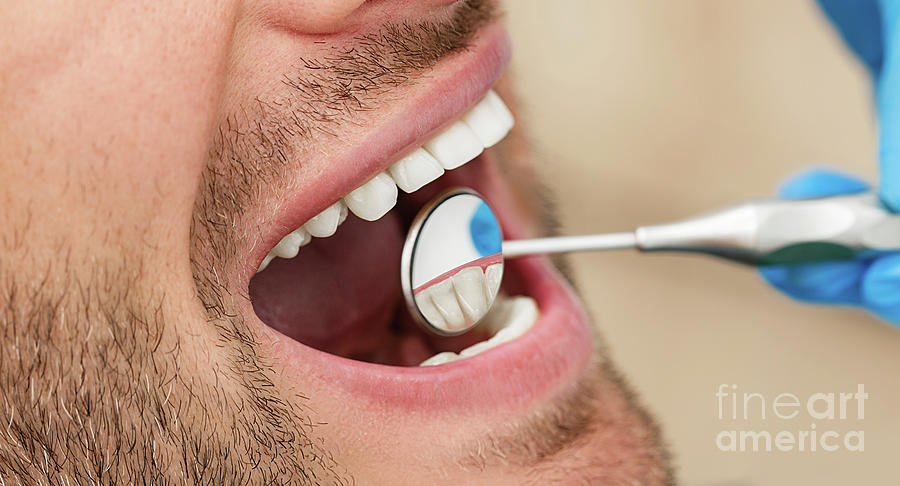 Dental Examination by Peakstock / Science Photo Library