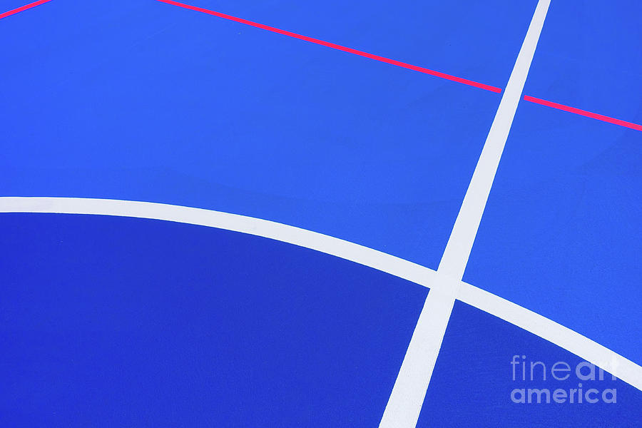 Design of a sports field, with blue background and red and yello Photograph by Joaquin Corbalan