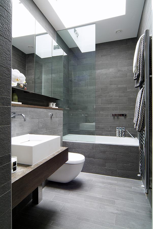 Designer Bathroom With Grey-tiled Walls And Floor Photograph by Wayne Vincent