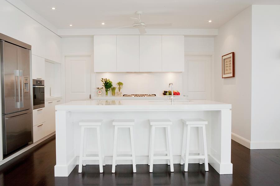Designer Kitchen With White Island And Retro Bar Stools Photograph by Bayside