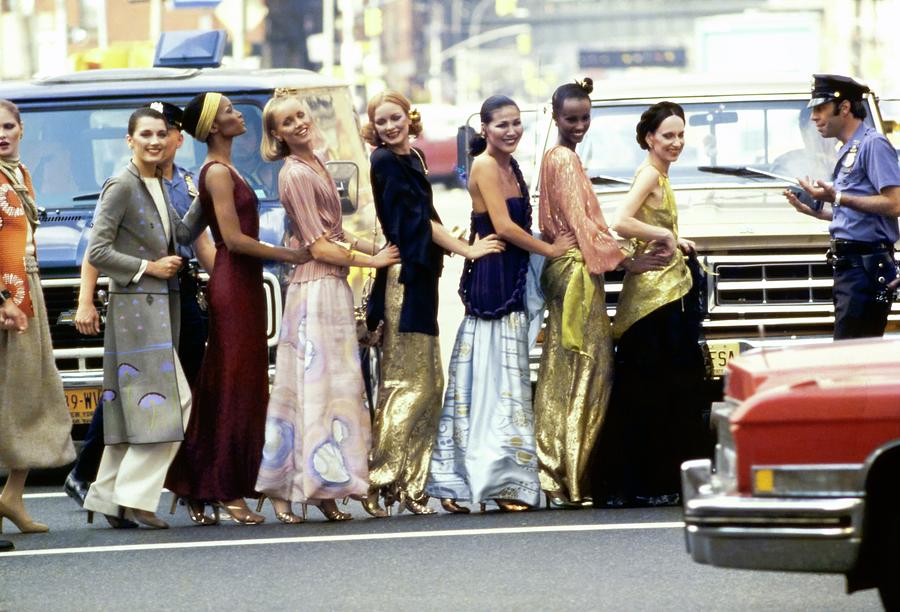 Person Photograph - Designer Mary Mcfadden And A Line Of Models by Oliviero Toscani