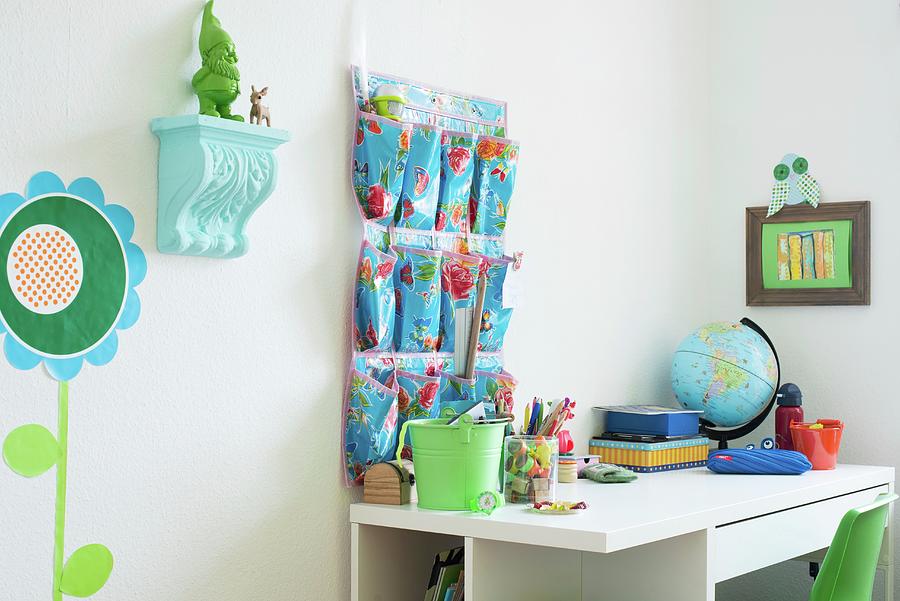 Desk And Wall Organiser In Childs Bedroom With Blue And Green Accents Photograph by Ulla@patsy